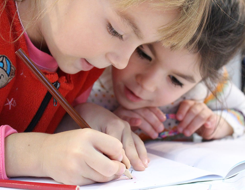 sisters homeschool and working together