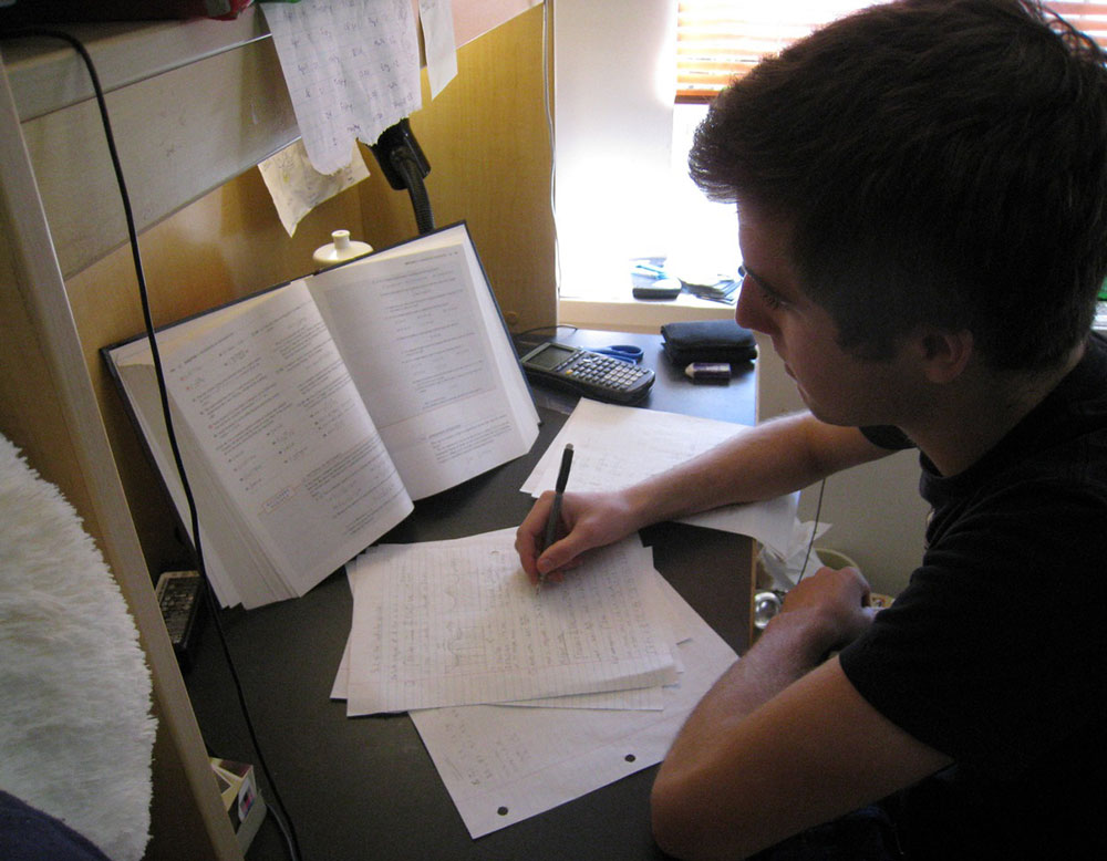 boy studying at home